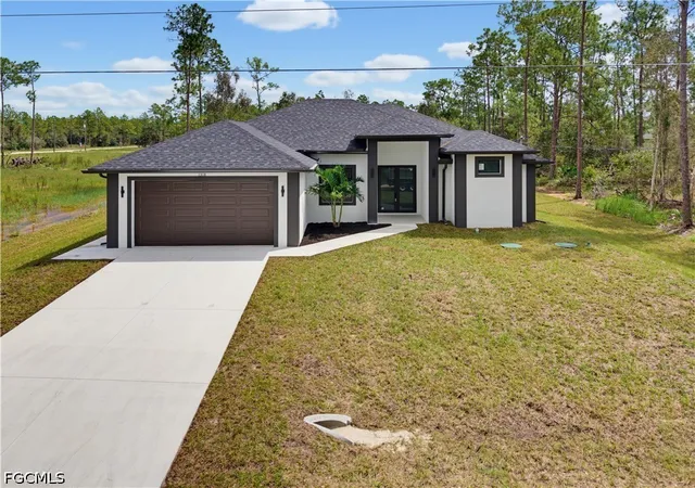Photo 1 of Single family home for sale at 1318 Roosevelt Ave, Lehigh Acres, FL 33972 | MLS# 2026031022 | Listing updated on 2026-10-01
