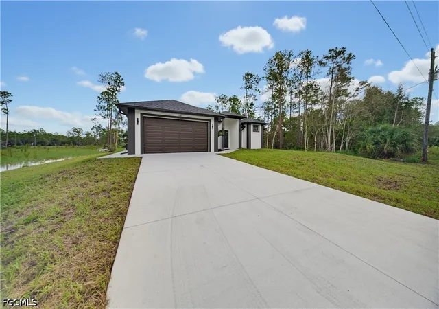 Photo 2 of Single family home for sale at 1318 Roosevelt Ave, Lehigh Acres, FL 33972 | MLS# 2026031022 | Listing updated on 2026-10-01