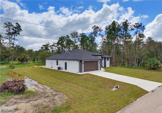 Photo 3 of Single family home for sale at 1318 Roosevelt Ave, Lehigh Acres, FL 33972 | MLS# 2026031022 | Listing updated on 2026-10-01