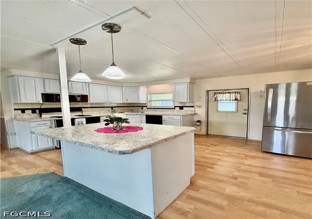 4th image of 518 Pine Tree Ct, North Fort Myers, FL 33917 | MLS# 2026031143