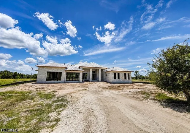 Photo 1 of Single family home for sale at 7517 4th Place, Lehigh Acres, FL 33936 | MLS# 2026031219 | Listing updated on 2026-07-26