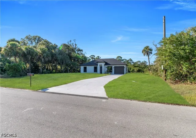 2nd image of 644 Woodcrest Dr, Lehigh Acres, FL 33972 | MLS# 2026031234