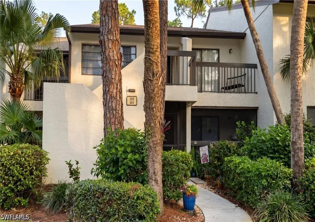 Listing Photo 2 - Condo for sale in building located at 1826 Kings Lake Blvd, Naples, FL 34112 - Unit #203