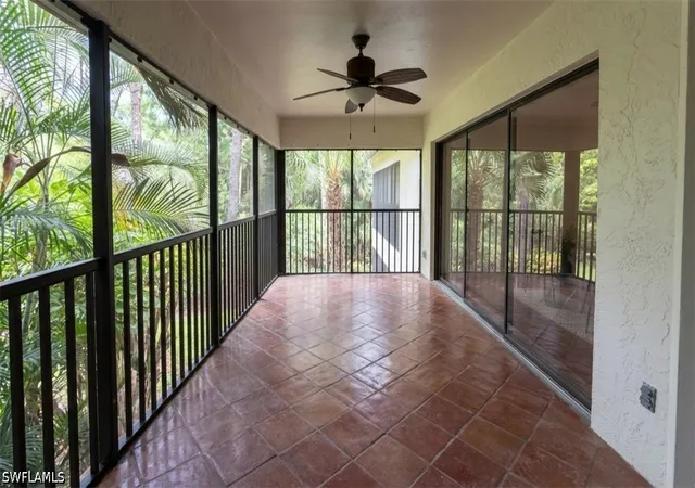 Listing Photo 4 - Condo for sale in building located at 1826 Kings Lake Blvd, Naples, FL 34112 - Unit #203