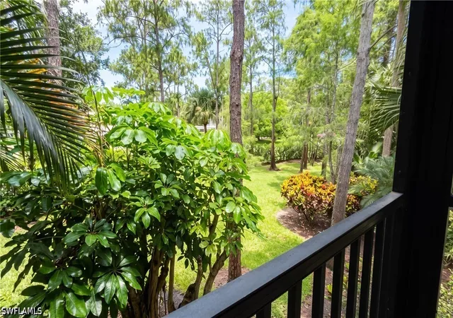 Listing Photo 5 - Condo for sale in building located at 1826 Kings Lake Blvd, Naples, FL 34112 - Unit #203