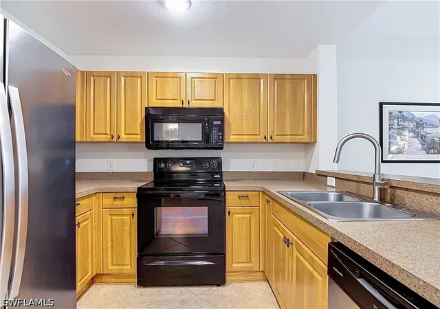 Listing Photo 4 - Condo for sale in building located at 4500 Botanical Pl Cir, Naples, FL 34112 - Unit #102