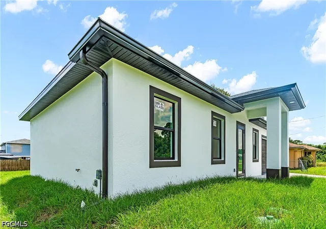 3rd image of 2923 2Nd St Sw, Lehigh Acres, FL 33976 | MLS# 2026031792