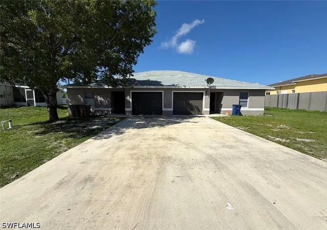Photo 1 of Multi family home for sale at 5109 5111 26th Street Sw, Lehigh Acres, FL 33973 | MLS# 226027464 | Listing updated on 2026-07-27