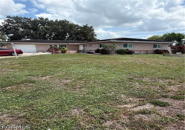 1st image of 225 Lake Dr, Lehigh Acres, FL 33936 | MLS# 2026031979