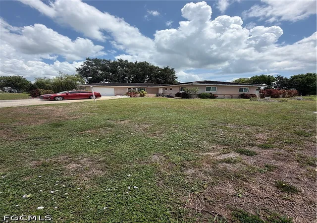 2nd image of 225 Lake Dr, Lehigh Acres, FL 33936 | MLS# 2026031979