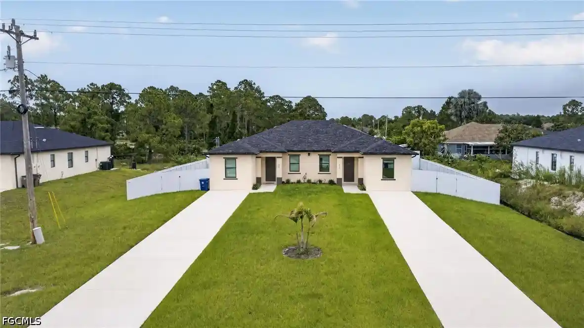 Multi family home for sale at 909/911 Homestead Rd S, Lehigh Acres, FL 33974 | MLS# 2026031998