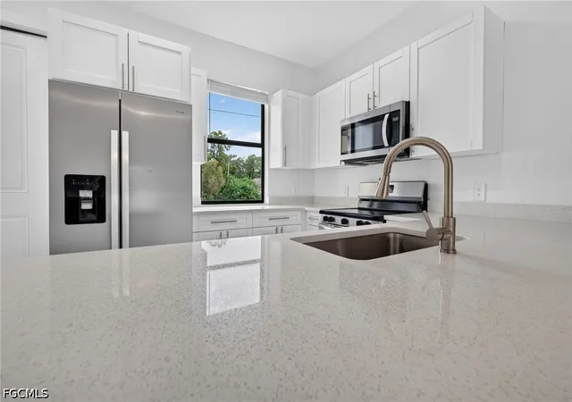 3rd image of 909/911 Homestead Rd S, Lehigh Acres, FL 33974 | MLS# 2026031998