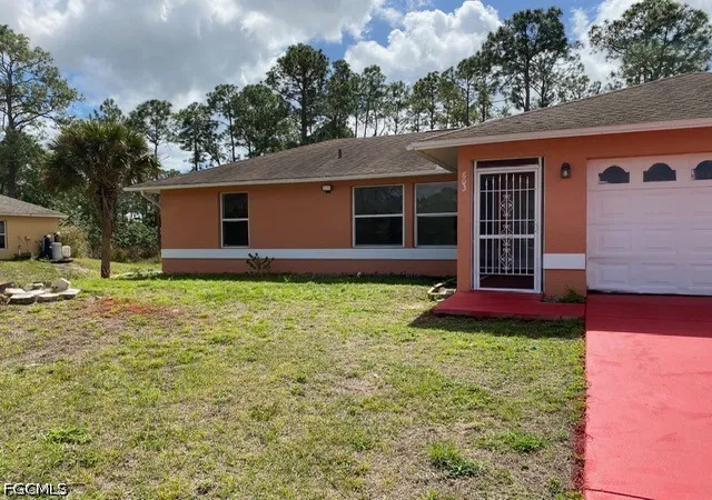 1st image of 803 W 9th St, Lehigh Acres, FL 33972 | MLS# 2026032020
