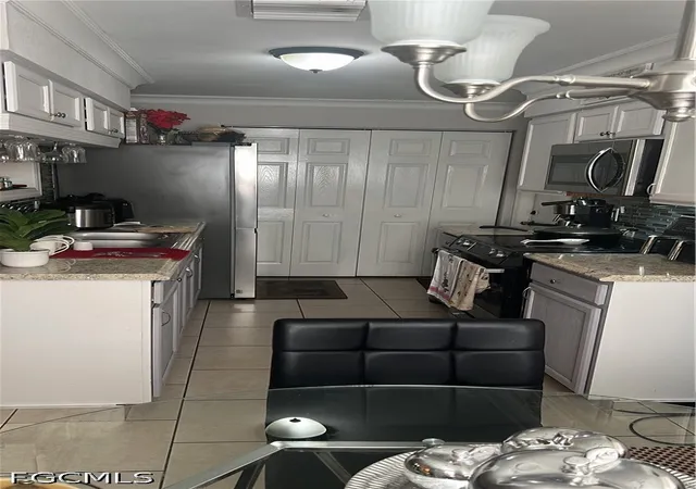 4th image of 1112 Cherokee Ave, Lehigh Acres, FL 33936 | MLS# 2026032223