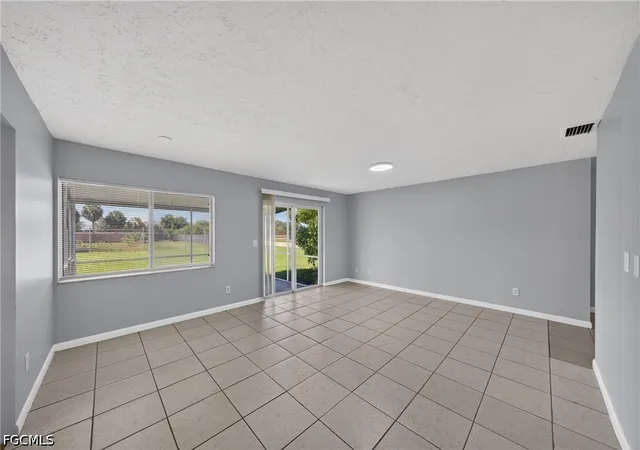 Photo 4 of Single family home for sale at 1418 SE 23rd Terrace, Cape Coral, FL 33990 | MLS# 2026032341 | Listing updated on 2026-08-31