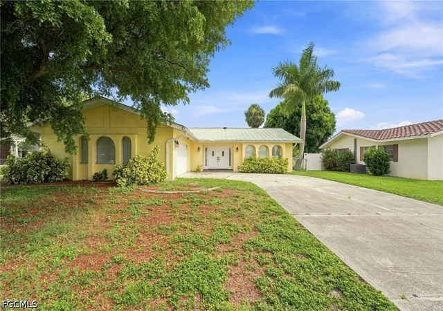 1st image of 902 El Dorado Pkwy E, Cape Coral, FL 33904 | MLS# 2026032410