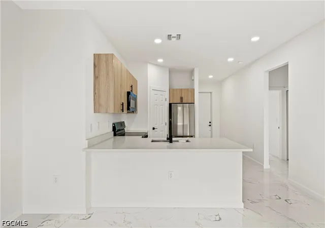 4th image of 3106 61St St W, Lehigh Acres, FL 33971 | MLS# 2026032627