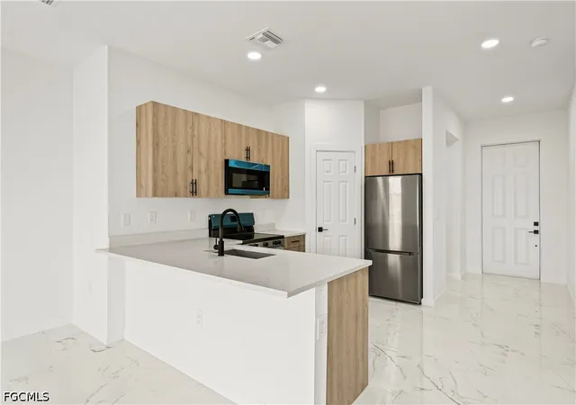 5th image of 3106 61St St W, Lehigh Acres, FL 33971 | MLS# 2026032627