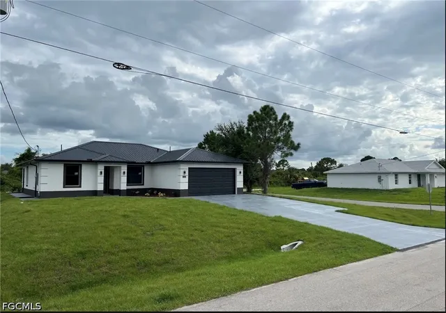 2nd image of 3119 63rd St W, Lehigh Acres, FL 33971 | MLS# 2026032641