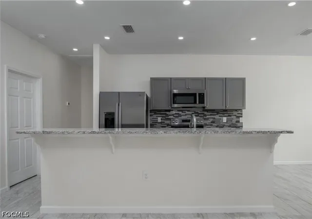 4th image of 311 Rand Ave, Lehigh Acres, FL 33974 | MLS# 2026032649