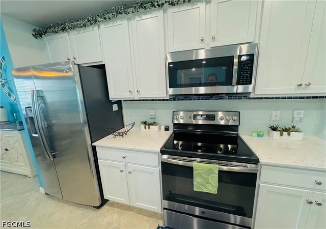 Listing Photo 4 - Condo for sale in building located at 10751 Palazzo Wy, Fort Myers, FL 33913 - Unit #303