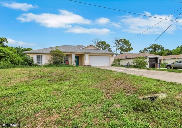 1st image of 277 Grant Blvd, Lehigh Acres, FL 33974 | MLS# 226027026