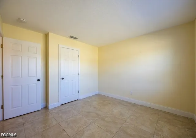 3rd image of 311 Tudor Dr, Cape Coral, FL 33904