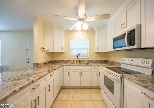 5th image of 311 Tudor Dr, Cape Coral, FL 33904