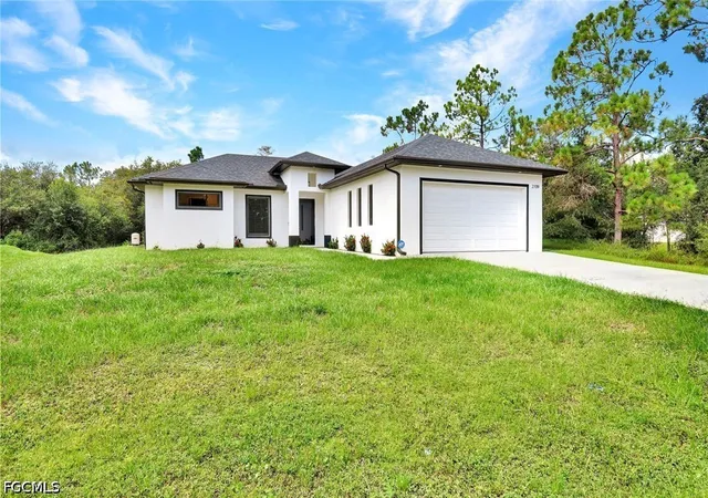 2nd image of 2709 53rd St Sw, Lehigh Acres, FL 33976 | MLS# 2026032963