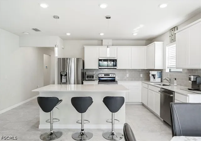 Photo 2 of Single family home for sale at 10761 Firebush Cir, North Fort Myers, FL 33917 | MLS# 2026033007 | Listing updated on 2026-08-07