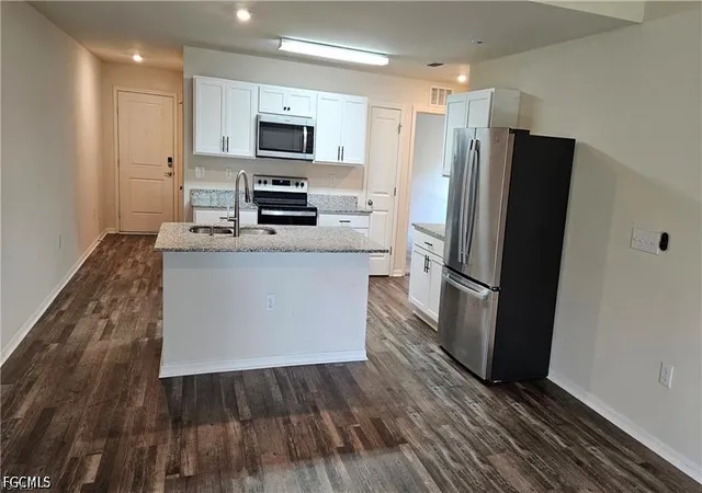 Photo 3 of Townhouse for sale at 9028 Aegean Cir, Lehigh Acres, FL 33936 | MLS# 2026033015 | Listing updated on 2026-08-04