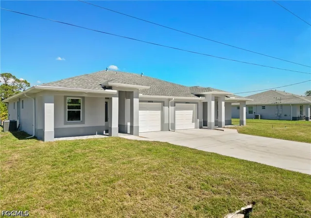 1st image of 1400/1402 W 12th St, Lehigh Acres, FL 33972 | MLS# 2026033099