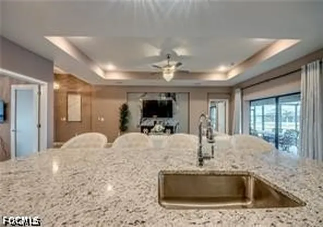Photo 3 of Single family home for sale at 1042 NW 32nd Place, Cape Coral, FL 33993 | MLS# 2026033257 | Listing updated on 2026-08-06