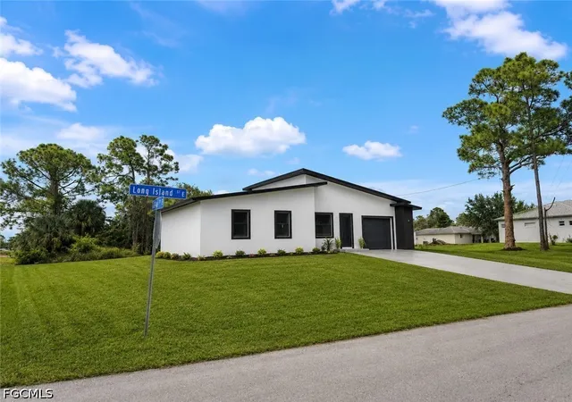 1st image of 703 Long Island St E, Lehigh Acres, FL 33974 | MLS# 2026033275