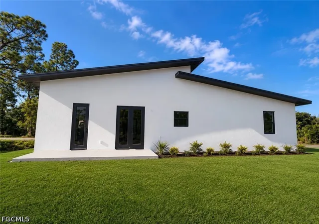 3rd image of 703 Long Island St E, Lehigh Acres, FL 33974 | MLS# 2026033275