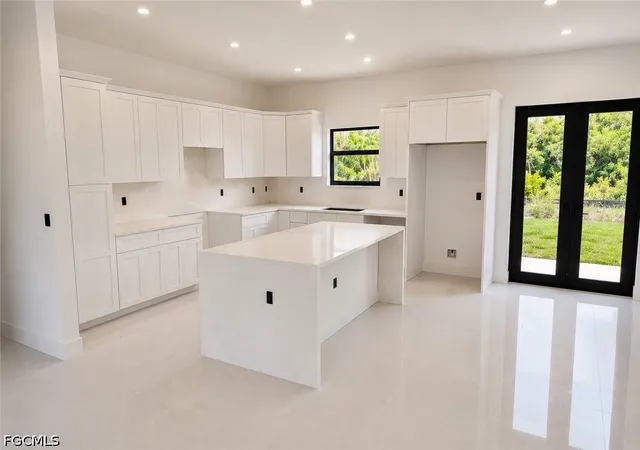 4th image of 703 Long Island St E, Lehigh Acres, FL 33974 | MLS# 2026033275
