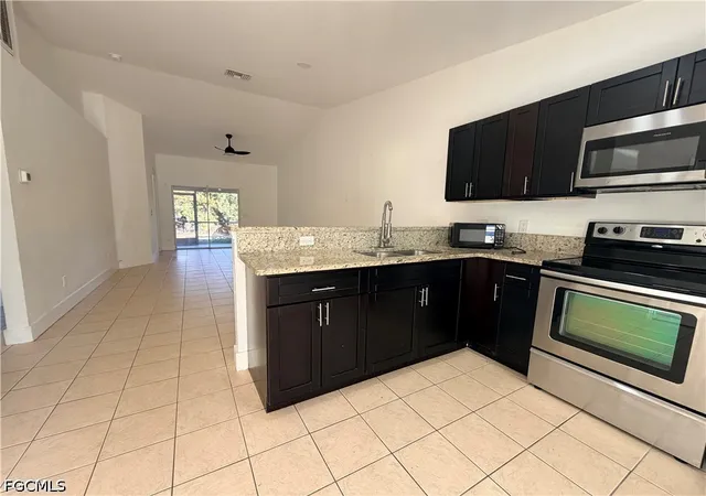 Listing Photo 1 - Condo for sale in building located at 1412-1414 W 12th St, Lehigh Acres, FL 33972