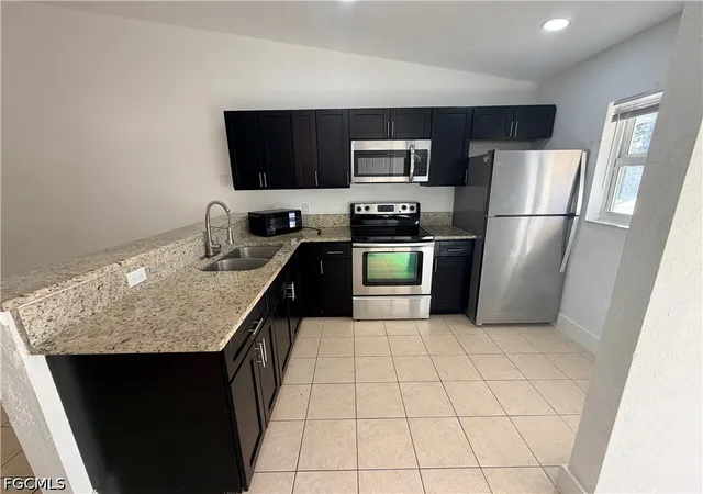 Listing Photo 3 - Condo for sale in building located at 1412-1414 W 12th St, Lehigh Acres, FL 33972