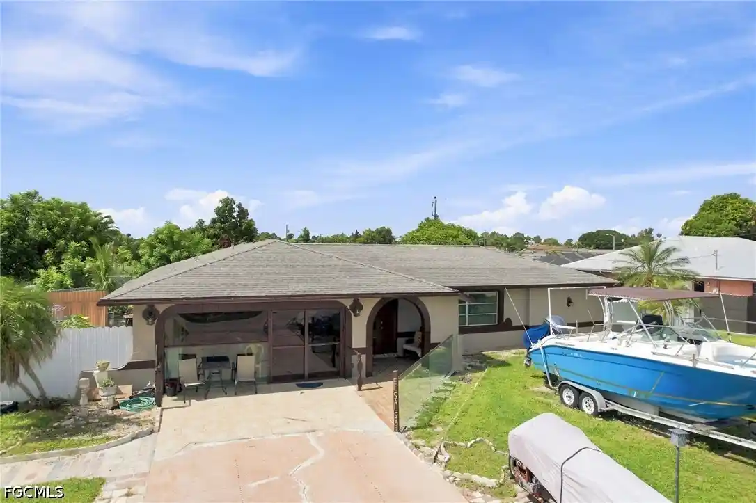 Photo 1 of Sale Pending at 1631 Country Clb Pkwy, Lehigh Acres, FL 33936 | MLS# 2026033564 | Listing updated on 2026-10-22