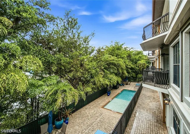 Listing Photo 5 - Condo for sale in building located at 705 10th St S, Naples, FL 34102 - Unit #202