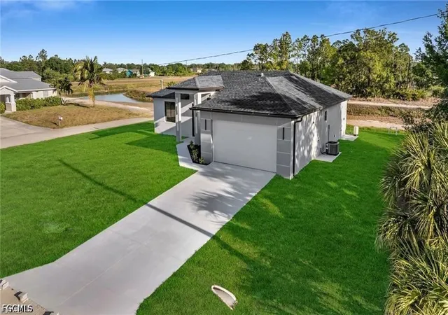 Photo 2 of Single family home for sale at 2106 W 18th Street, Lehigh Acres, FL 33972 | MLS# 2026034083 | Listing updated on 2026-10-06