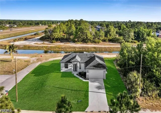 Photo 4 of Single family home for sale at 2106 W 18th Street, Lehigh Acres, FL 33972 | MLS# 2026034083 | Listing updated on 2026-10-06