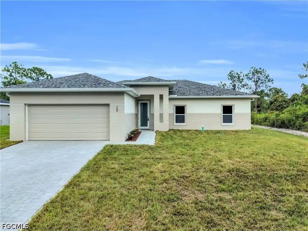Photo 1 of Single family home for sale at 309 Broward Ave, Lehigh Acres, FL 33974 | MLS# 2026034523 | Listing updated on 2026-10-23