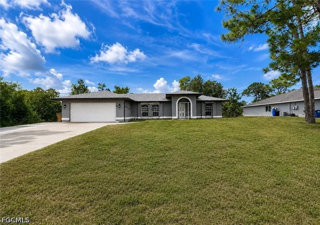 1st image of 2411 Millie Ave S, Lehigh Acres, FL 33973 | MLS# 2026036366