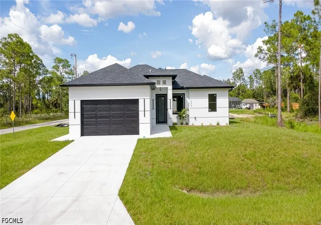 Photo 1 of Single family home for sale at 706 W 11th St, Lehigh Acres, FL 33972 | MLS# 2026036619 | Listing updated on 2026-10-06
