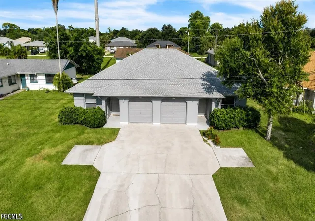 Photo 1 of Multi family home for sale at 405/407 Ne 24th Avenue, Cape Coral, FL 33909 | MLS# 2026036782 | Listing updated on 2026-08-31
