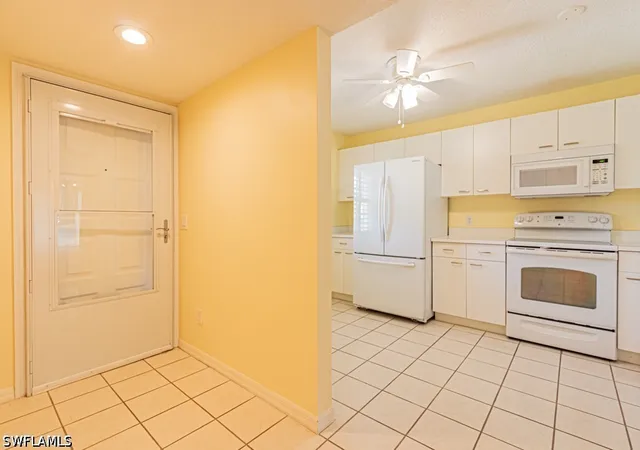 Listing Photo 5 - Condo for sale in building located at 7768 Jewel Ln, Naples, FL 34109 - Unit #102