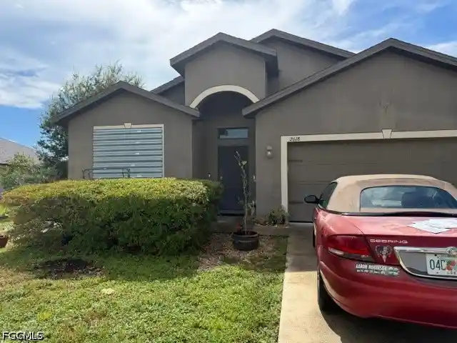 Single family home for sale at 2618 SW 21st Place, Cape Coral, FL 33914 | MLS# 2026037335