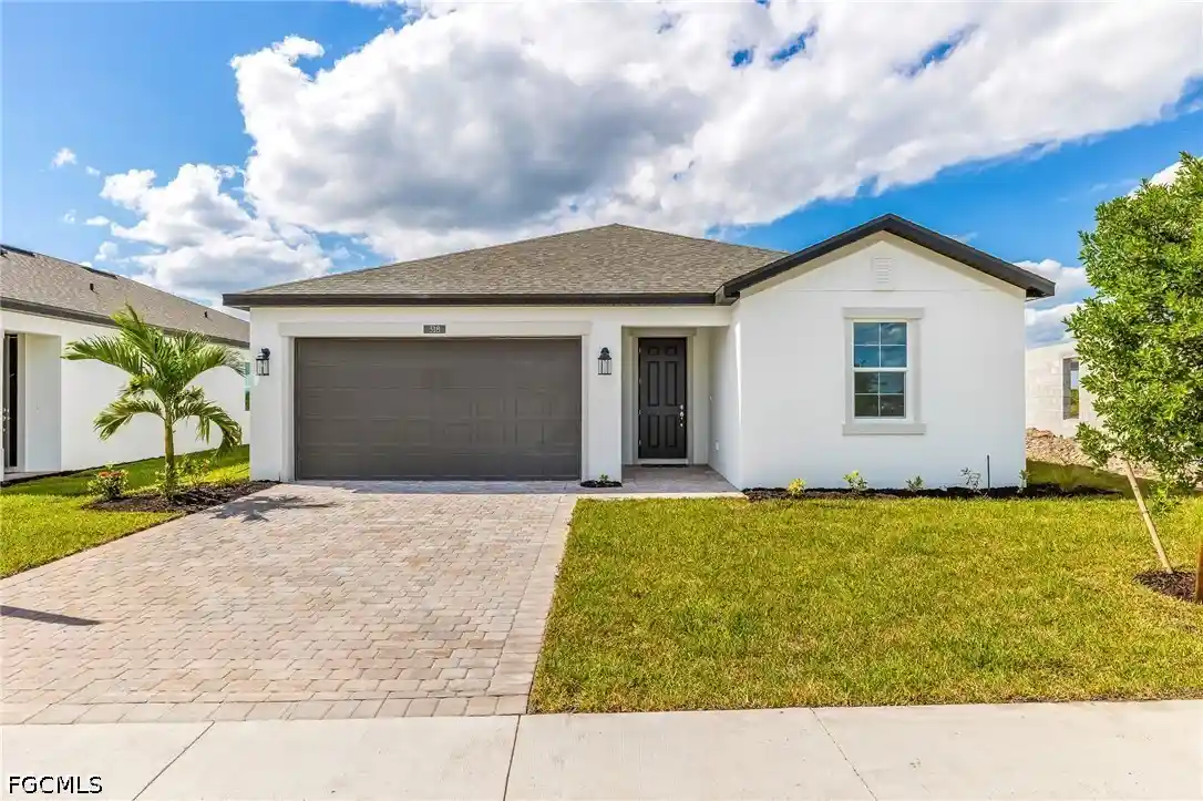 Single family home for sale at 318 Lakeside Hideaway Ln, Lehigh Acres, FL 33936 | MLS# 2026038194
