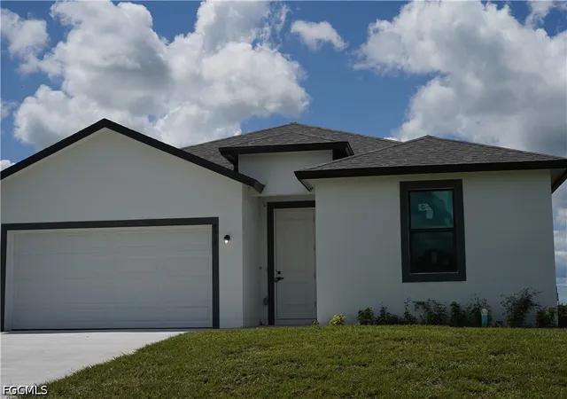 Photo 1 of Single family home for sale at 605 Greenbriar Blvd, Lehigh Acres, FL 33972 | MLS# 2026039132 | Listing updated on 2026-09-23